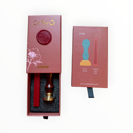 Cate Paper Co. Poppy wax seal stamp set open dusty rose box showing brass stamp and red wax stick