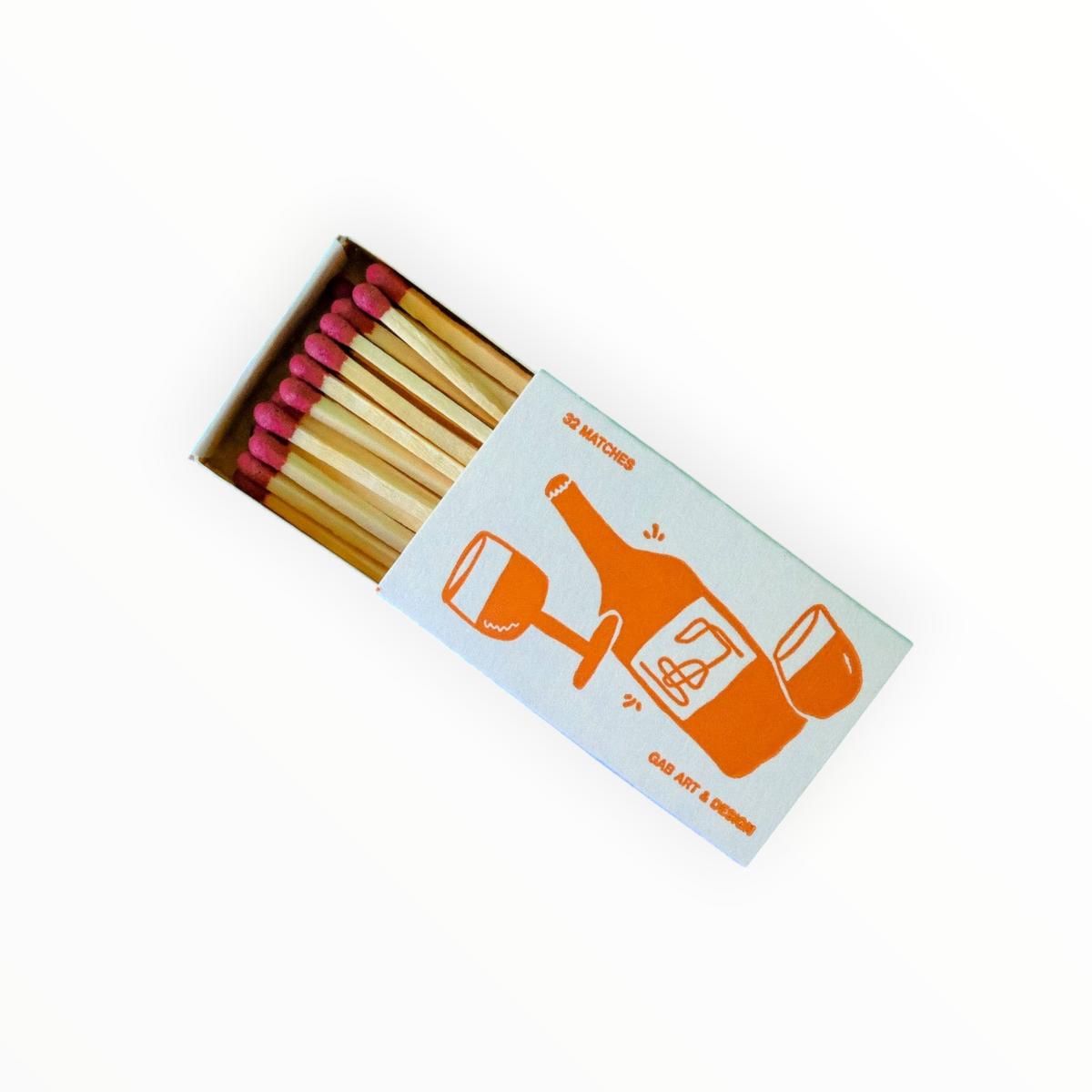 An open matchbox of 20 matches with pink tips, featuring a white and orange graphic design with illustrations of a bottle, wine glass, and cocktail glass, photographed on a clean white background.