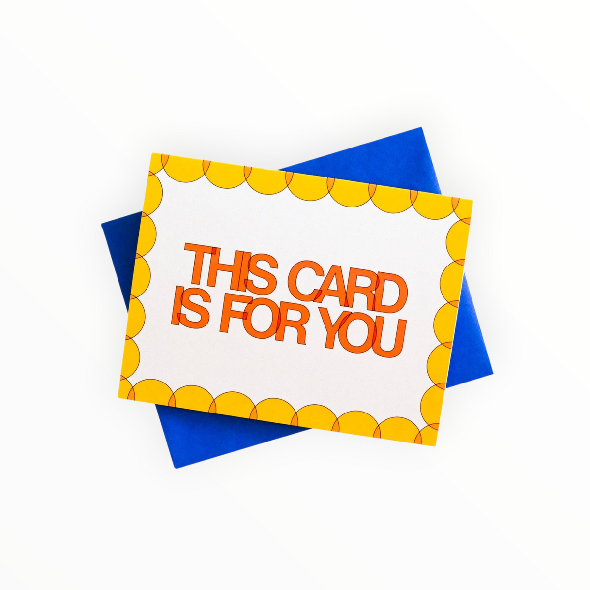 A square greeting card with a white center, orange text reading 'THIS CARD IS FOR YOU,' and a yellow scalloped border, shown on top of blue envelopes against a white background.
