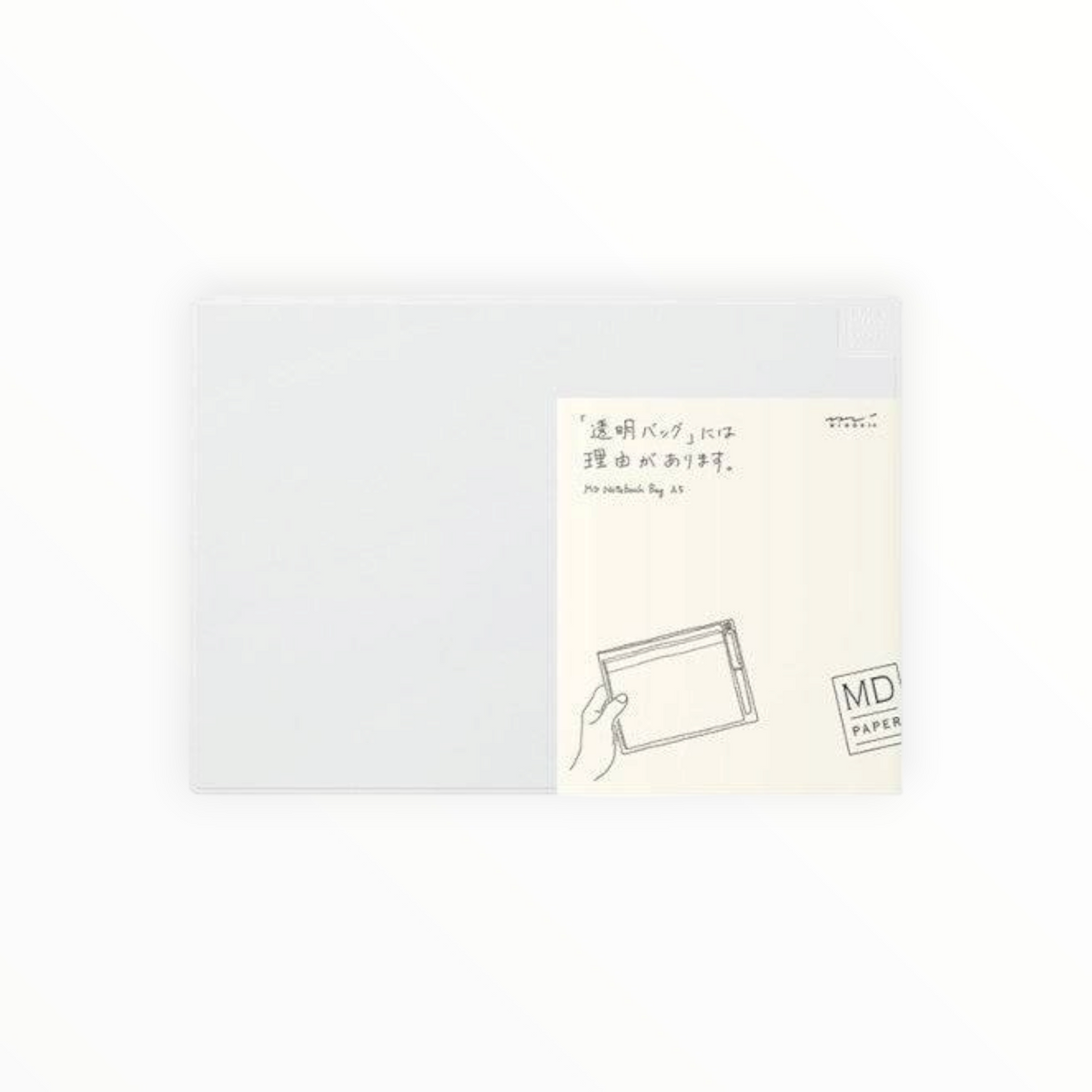 A sheet of translucent white paper partially covering a cream-colored backing card. The backing card features a minimalist illustration of a hand holding a rectangular box and includes Japanese text, the English phrase 'to be carved by age,' and the brand 'MD PAPER'.