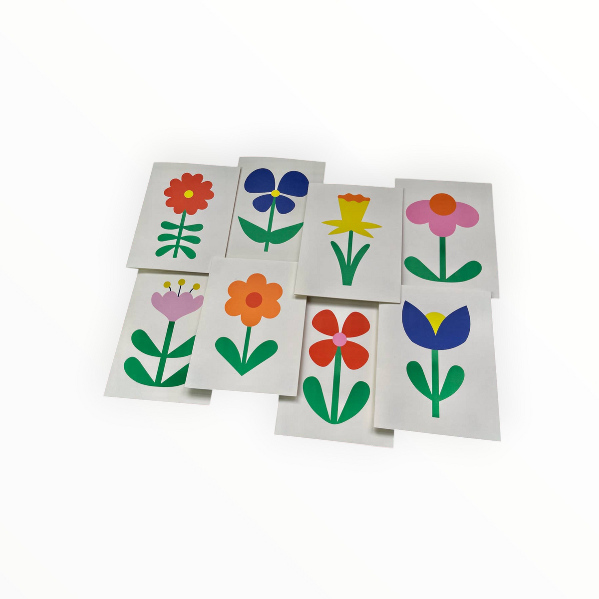 A set of small rectangular cards or tiles featuring colorful stylized flower illustrations on a white background.
