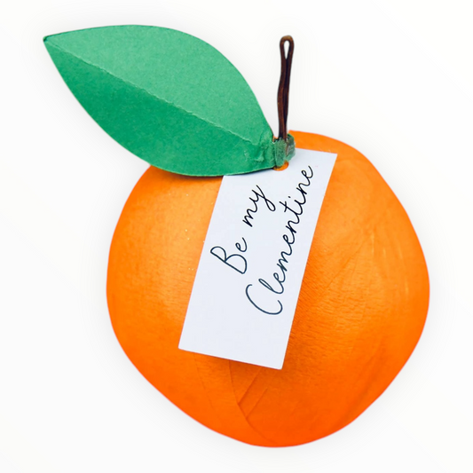 Mini Surprise Ball Be My Clementine by TOPS Malibu, orange crepe ribbon with vintage toys charms and gems inside