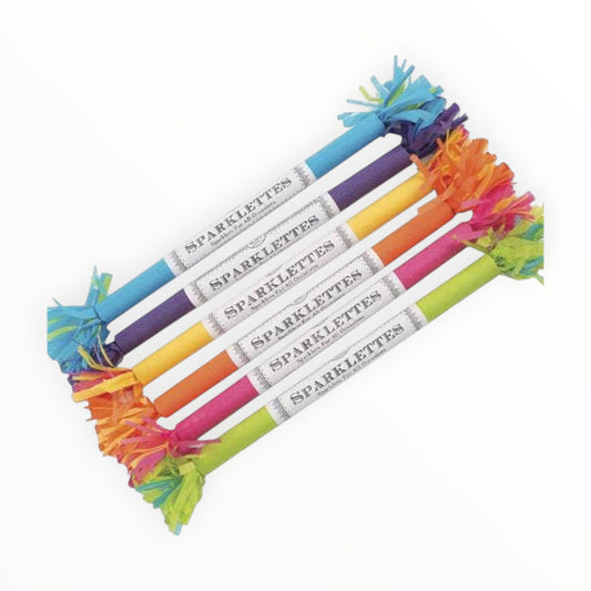 Five Sparklettes party sticks with colorful tissue paper tassels, arranged diagonally on a white background.