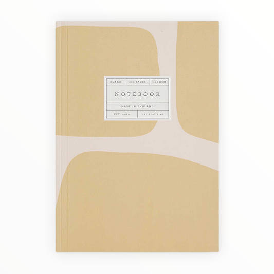 Giraffe Print Cover Notebook by Katie Leamon, tan and pink giraffe print, 300 blank pages, lay-flat binding, A5, 5.875 x 8.25 inches, made in England