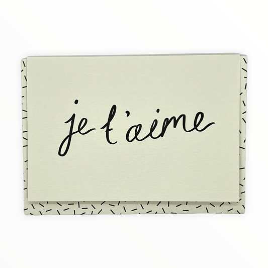 Je T'aime greeting card by Katie Leamon, blank interior, black confetti envelope, 4.25 x 5.5 inches, made in England