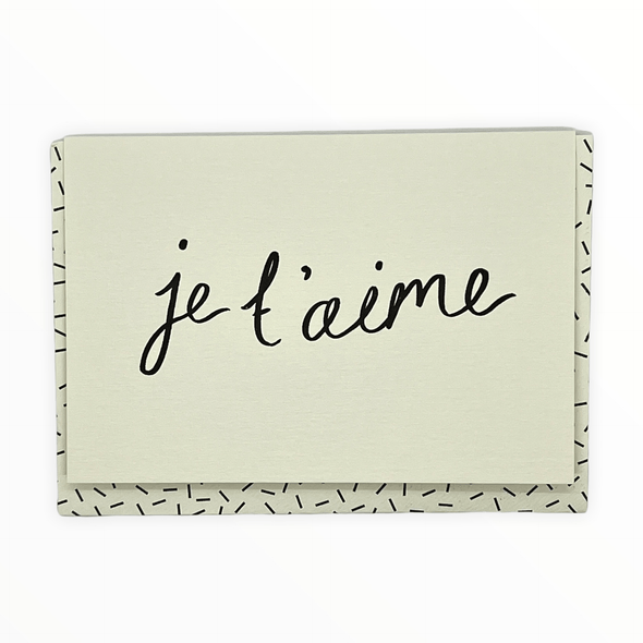 Je T'aime greeting card by Katie Leamon, blank interior, black confetti envelope, 4.25 x 5.5 inches, made in England
