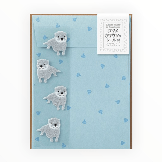 Otter Stationery Letterset by Midori, 12 sheets lined ivory paper with otter print, 4 envelopes, 4 fuzzy gray otter sealing stickers, 4.5 x 6 inches