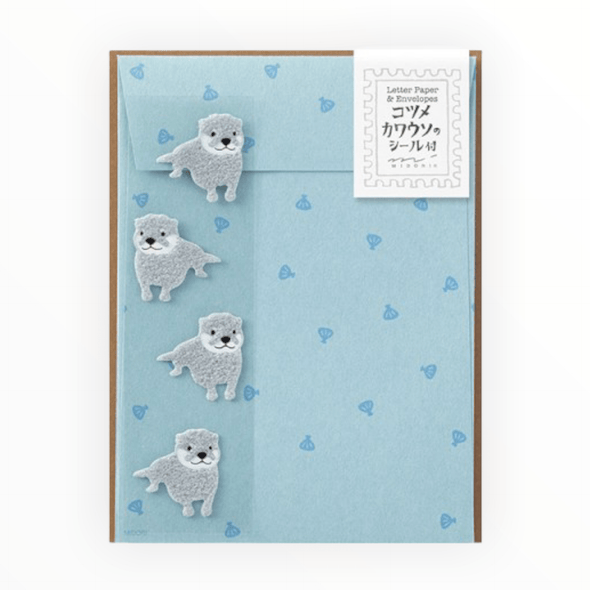 Otter Stationery Letterset by Midori, 12 sheets lined ivory paper with otter print, 4 envelopes, 4 fuzzy gray otter sealing stickers, 4.5 x 6 inches