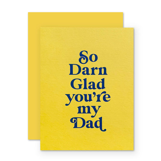 So Darn Glad You're My Dad Father's Day card by The Social Type, blank interior, bright yellow card with blue lettering and yellow envelope, 5.5 x 4.25 inches